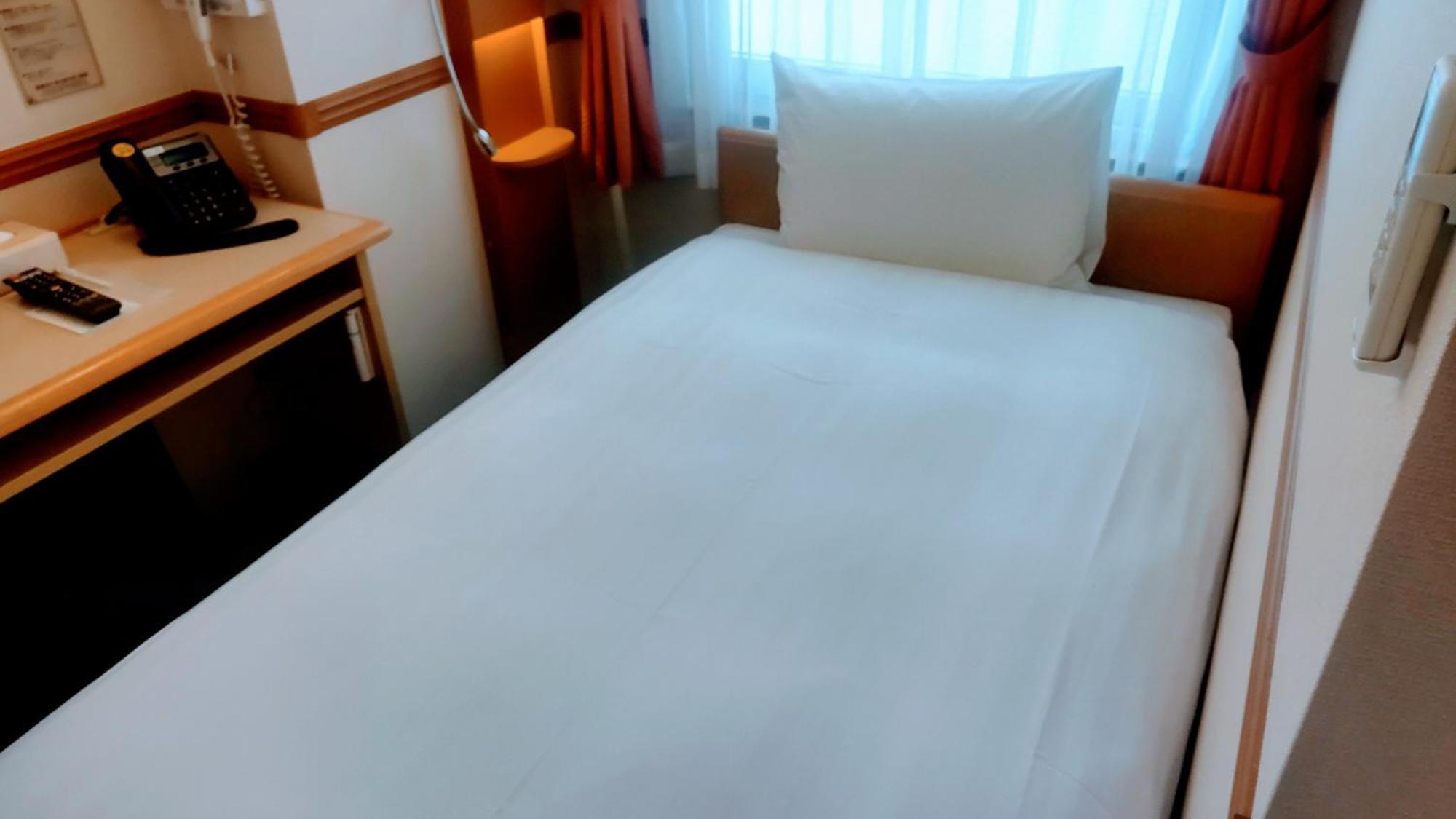 Toyoko Inn Shin-Osaka Chuo-Guchi Shinkan Rom bilde